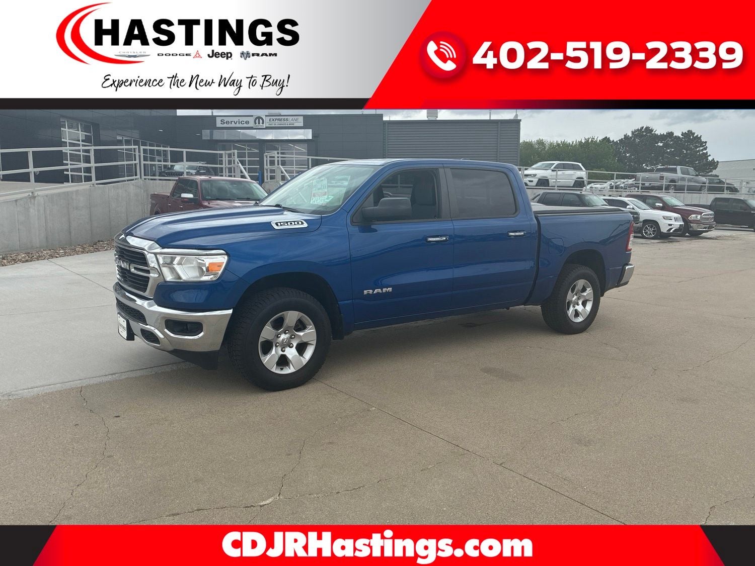 2019 RAM 1500 Big Horn/Lone Star Crew Cab 4x4 5'7' Box in Blue Streak Pearlcoat — front three-quarter view