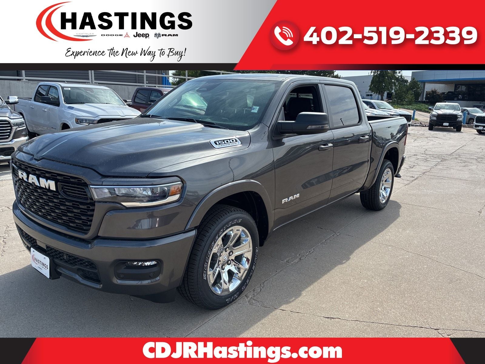 2026 RAM Ram 1500 RAM 1500 BIG HORN CREW CAB 4X4 5'7' BOX in Granite Crystal Metallic Clear-Coat Exterior Paint — front three-quarter view