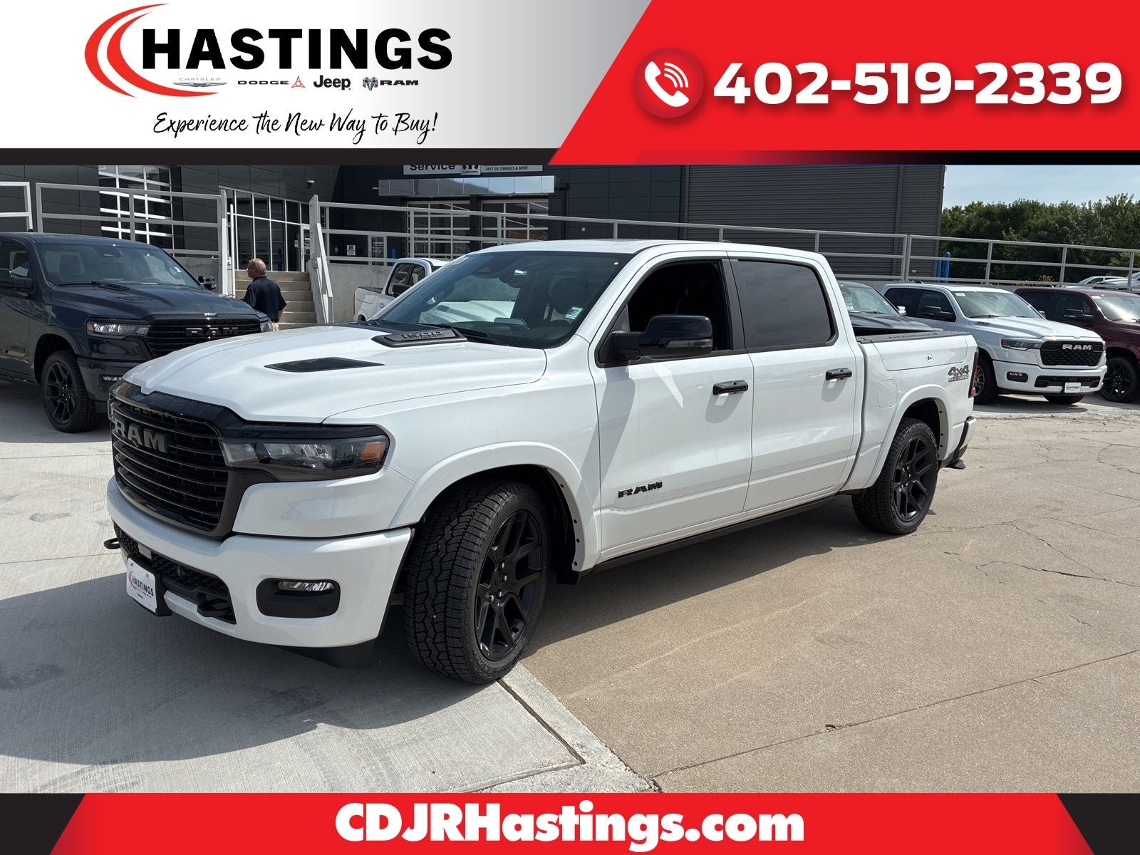 2026 RAM Ram 1500 RAM 1500 LARAMIE CREW CAB 4X4 5'7' BOX in Ivory White Tri-Coat Pearl-Coat Exterior Paint — front three-quarter view