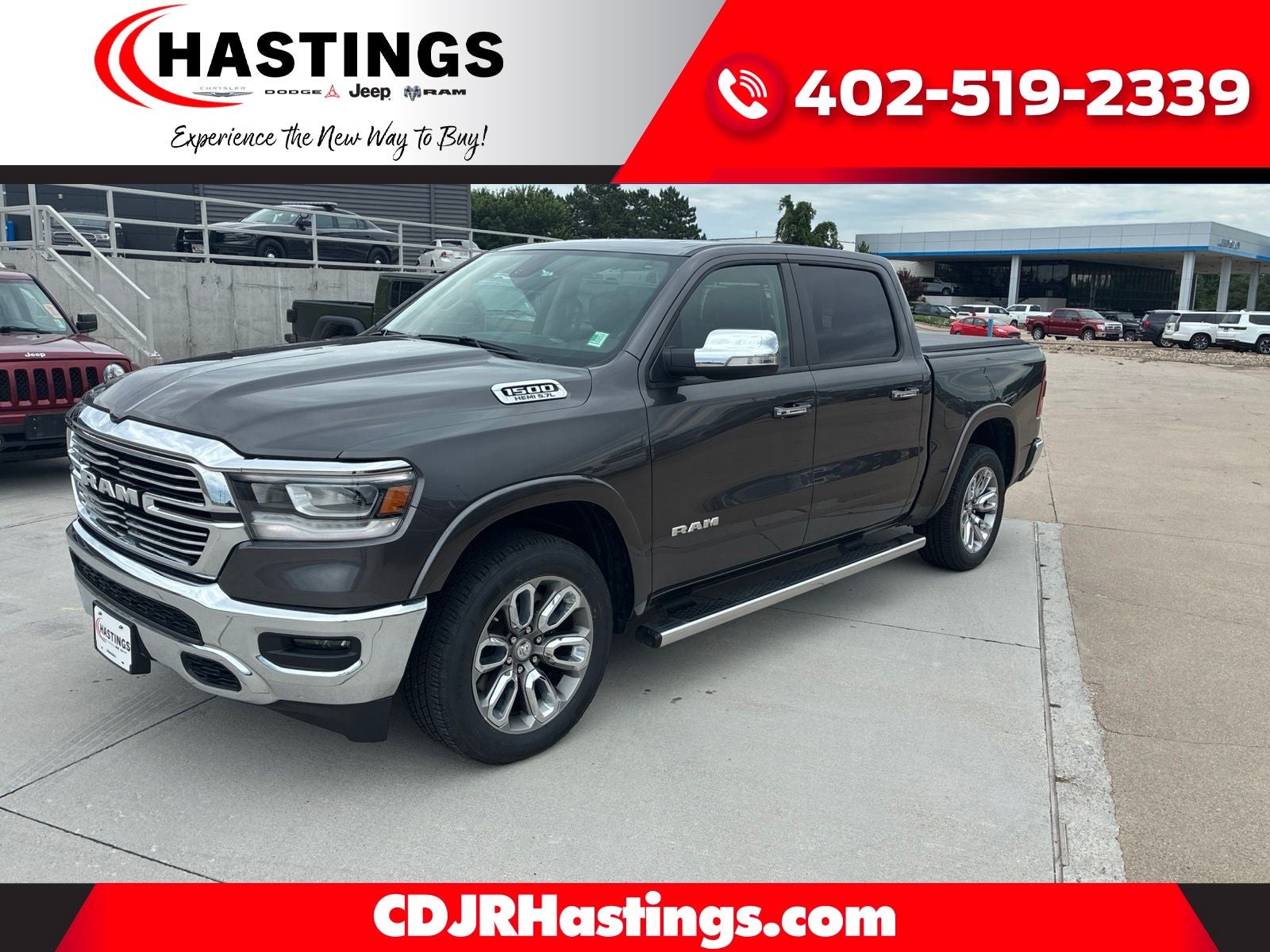 2020 RAM 1500 Laramie Crew Cab 4x4 5'7' Box in Granite Crystal Metallic Clearcoat — front three-quarter view