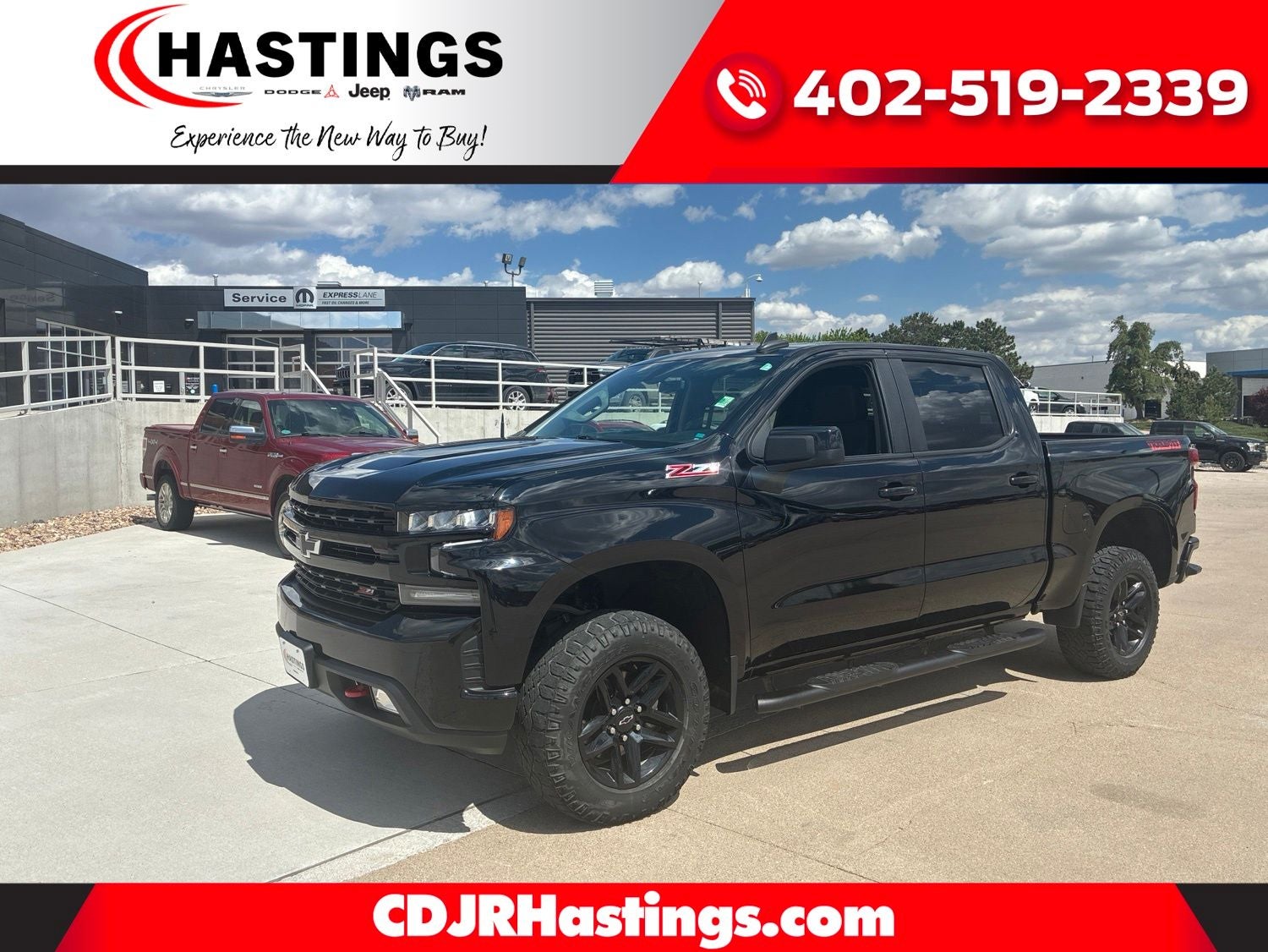 2021 Chevrolet Silverado 1500 4WD Crew Cab Short Bed LT Trail Boss in Black — front three-quarter view