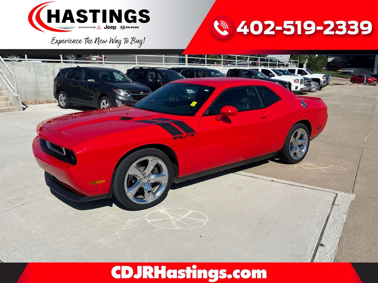 2014 Dodge Challenger R/T in Torred — front three-quarter view