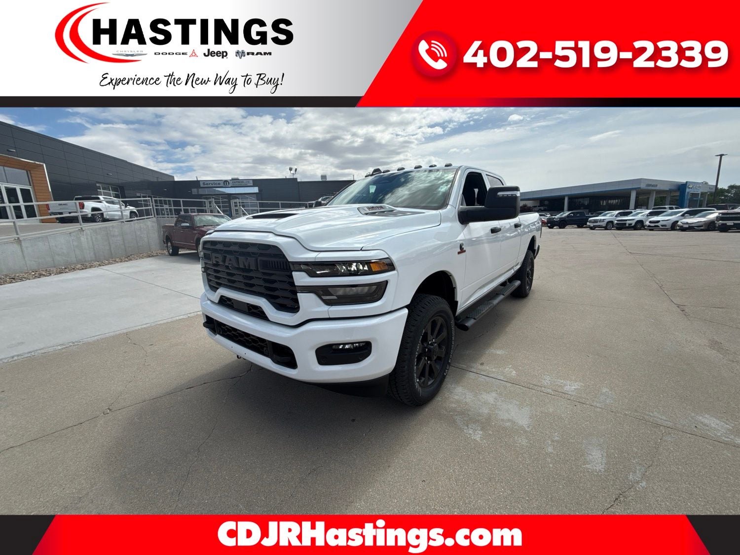 2026 RAM Ram 2500 RAM 2500 BLACK EXPRESS CREW CAB 4X4 6'4' BOX in Bright White Clear-Coat Exterior Paint — front three-quarter view