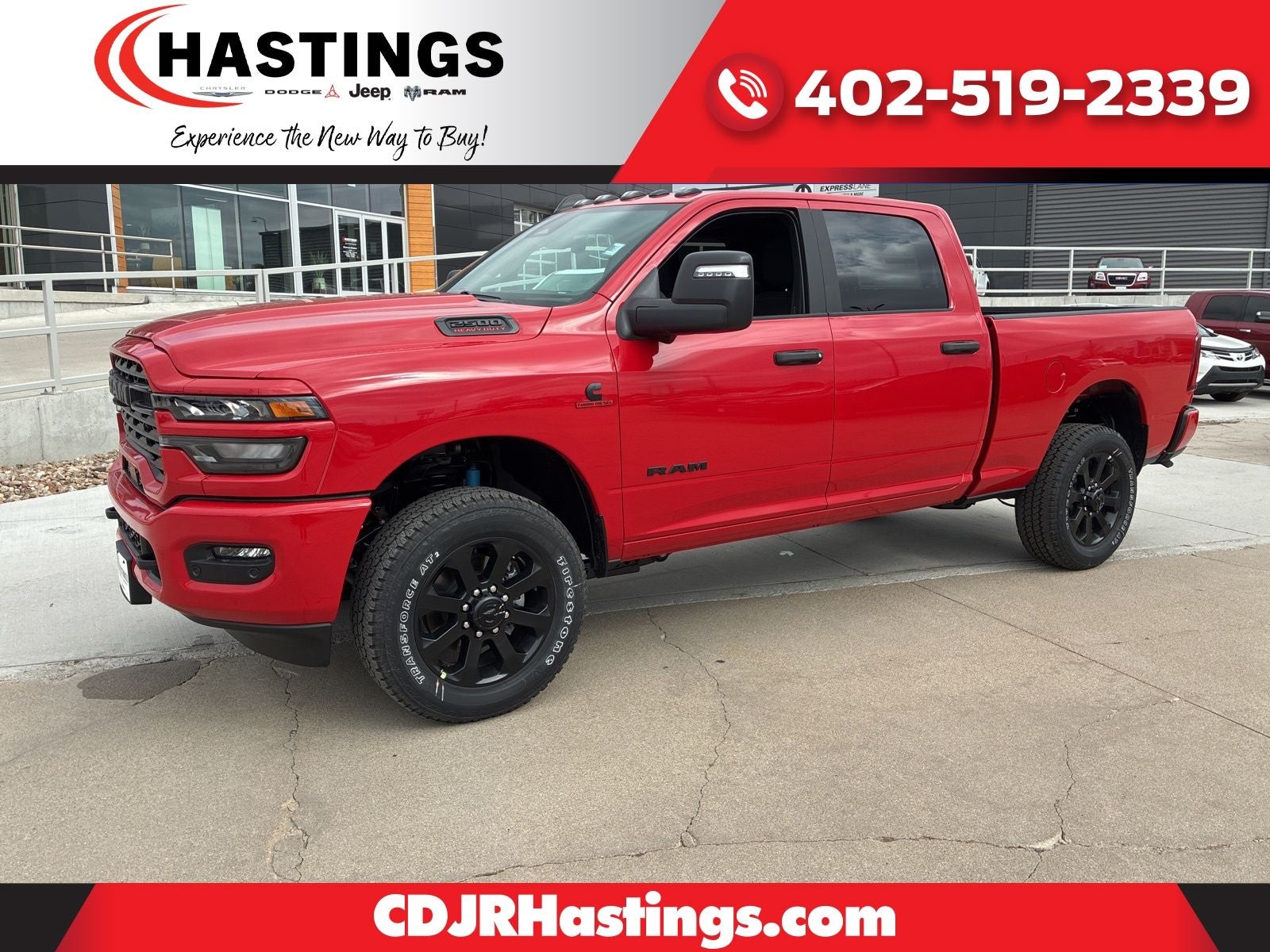 2026 RAM Ram 2500 RAM 2500 BIG HORN CREW CAB 4X4 6'4' BOX in Flame Red Clear-Coat Exterior Paint — front three-quarter view