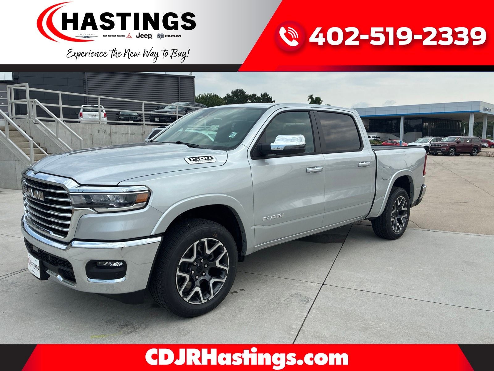 2026 RAM Ram 1500 RAM 1500 LARAMIE CREW CAB 4X4 5'7' BOX in Silver Zynith Exterior Paint — front three-quarter view