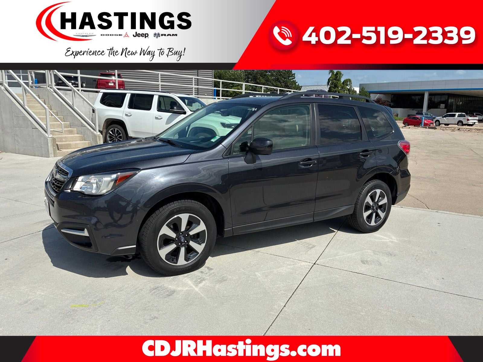 2018 Subaru Forester 2.5i Premium in Dark Gray Metallic — front three-quarter view